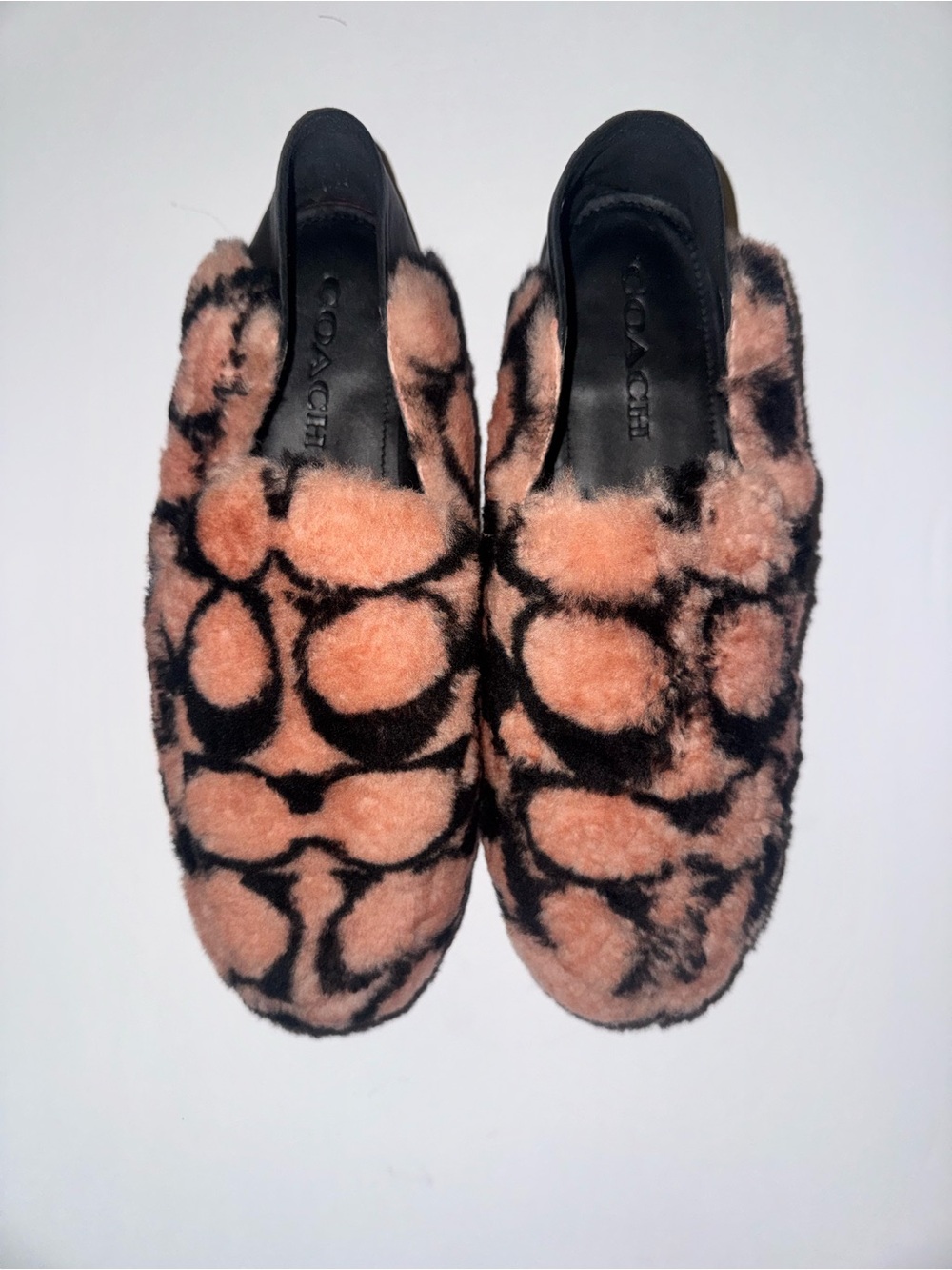 Coach Women's Fuzzy Slip-On Mules in Peach and Black Signature Print